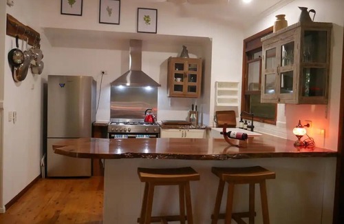 Cow Bay House | Romantic rainforest retreat with magical waterfall