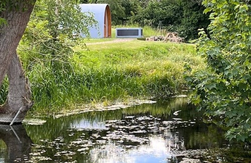 Legbourne Cabin | Romantic Riverside Pod with Private Hot Tub