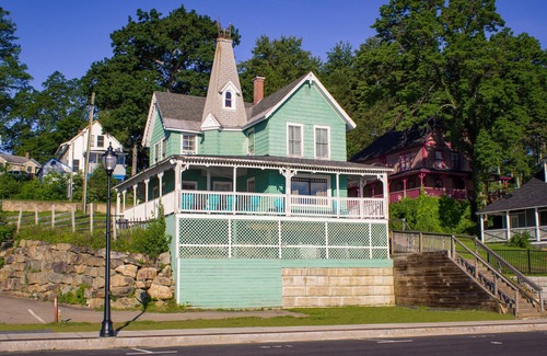 Weirs Beach House | Romeo's Balcony - At the Center of Weirs Beach