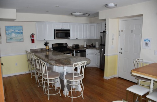 Seaside Heights Condo | Roof top pool & game room, 2 blocks to beach, 3/bedrooms, beach passes included