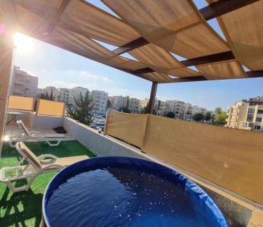 Amman Apartment | Rooftop pool with terraces F-R
