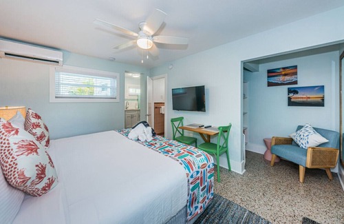 Sunset Beach Hotel | Room 10 · Renovated Boutique Hotel room with a Pool and dock