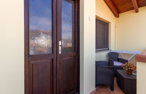 Palmas Arborea Apartment | Room 'Camera 4' with Shared Terrace, Wi-Fi and Air Conditioning