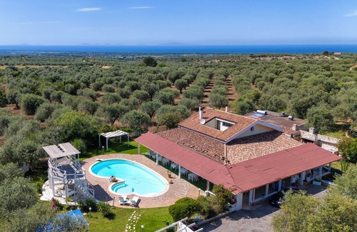 Sorso Apartment | Room 'Double Corbezzolo Con Patio' with Shared Pool, Private Terrace and Air Conditioning