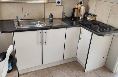 Govan Mbeki House | Room in B&B - Khutsong Apartmentss