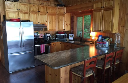 Grantsburg Cabin | Room to Relax on Big Wood Lake with Pontoon Boat Option! Available Year Round!