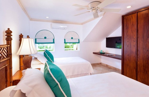 Merlin Bay Villa | Royal Westmoreland-Cherry Red in St James by Personal Villas - Modern Caribbean Villa with Pool Deck