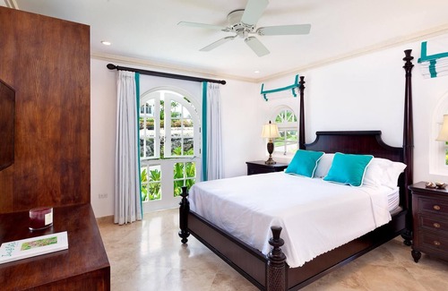 Merlin Bay Villa | Royal Westmoreland-Cherry Red in St James by Personal Villas - Modern Caribbean Villa with Pool Deck