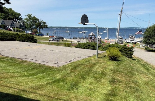 Bayside Cottage | Rustic cottage a block from the water at 19 Broadway, Bayside, Northport w/WiFi