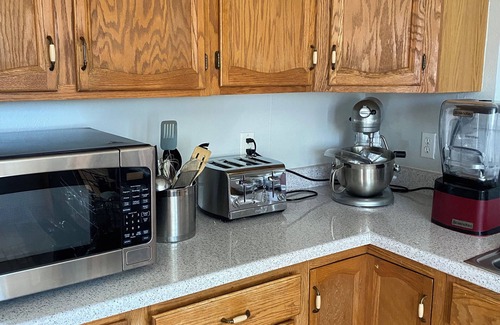 Worland House | Rustic Country 2-bedroom house with gas fireplace.