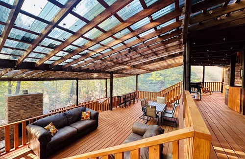 Sevierville Cabin | Rustic Luxury in the Smokies: 3-Level Deck, Treehouse, Hot Tub and Games Galore