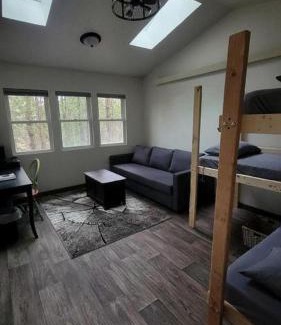 Elba House | Rustic Tree House with Woodland Valley Views in Elba, Minnesota