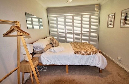 Forresters Beach House | Saltwater at Forresters Beach. Family and Pet Friendly. Walk to the Beach.