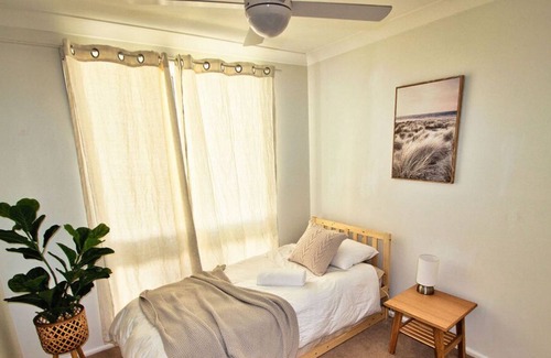 Forresters Beach House | Saltwater at Forresters Beach. Family and Pet Friendly. Walk to the Beach.