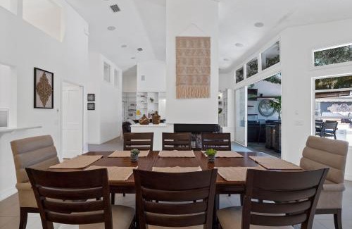 Palm Harbor House | SALTY TURTLE Luxury Salt Water Pool Home on Salt Water Canal with Tiki Bar