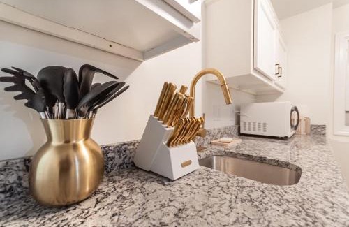 Park Forest Village Apartment | Sanctuary on Sylvan with Golden King Bed