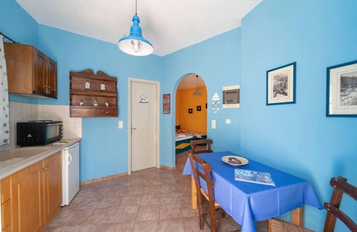 Megalochori Apartment | Santorious Flower Covered Apartment