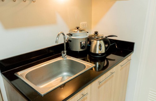Puerto Princesa City Centre Apartment | Sapphire 2 Bedroom Apartment with a Private Pool and Gym