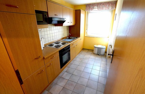 Westeraccumersiel Apartment | Schöne Ferienwohnung Windstärke12 mit Balkon