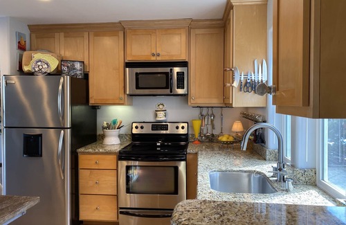 Upper Seabright House | Seabright unique retreat. Townhouse radiant with natural light and decor.