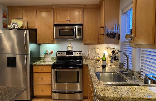 Upper Seabright House | Seabright unique retreat. Townhouse radiant with natural light and decor.