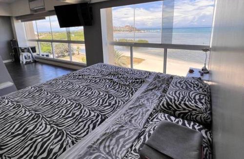 Margarita Island Apartment | SeafrontApartment-Sleeps4-Pool-Parking-Garden