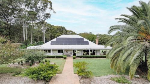 Wamberal House | Secluded Acerage With Floodlit Tennis and Basketball Courts, Pool, Firepit and Beautiful Homestead