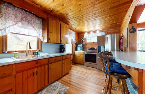 The Bays Cottage | Secluded bayfront cottage with private beach, grill, & bay views