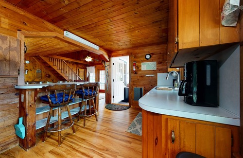 The Bays Cottage | Secluded bayfront cottage with private beach, grill, & bay views