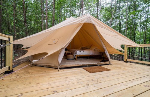 Great Cacapon RV Rental | Secluded Canvas Tent Nestled in the Trees