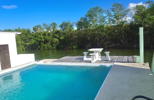 Belize City Apartment | See Belize TRANQUIL Sea View 2nd Floor Studio with Pool and Overwater Deck