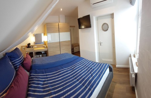 Tossens Cottage | Segel-zimmer - Ferienzimmer Villa Küstenwind