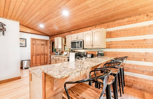 Kodak Cabin | Serene cabin with pool, hot tub, game room, fireplace, & free attraction tickets