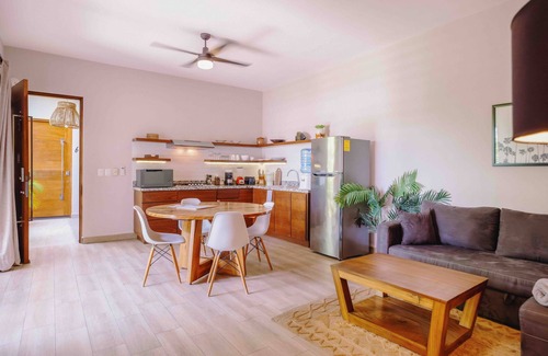 Colonos Cuzamil Apartment | Serviced 1-Bedroom Apartment · Rooftop BBQ + Pool · Bikes · Security