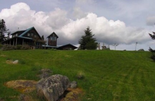 Friday Harbor Apartment | Shared hot tub with meadow view