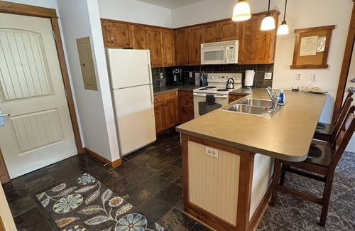 Kellogg Condo | Shared Roof Top Hot tub Silver Mtn adjoining studio available also