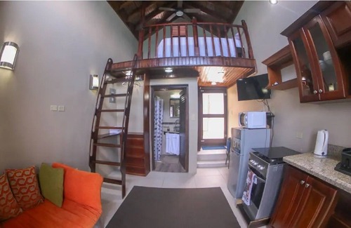 Tower Isle Apartment | Ship watchers Oceanfront Tiny House Retreat with Mezzanine and Private Jetty