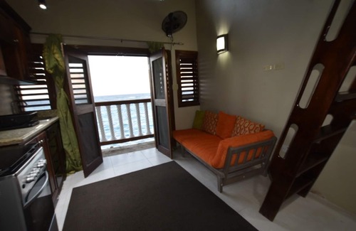 Tower Isle Apartment | Ship watchers Oceanfront Tiny House Retreat with Mezzanine and Private Jetty