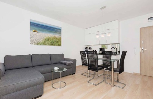Swinoujscie Apartment | Sikorskiego 1 Świnoujście | Beige and Grey Apartment with Balcony