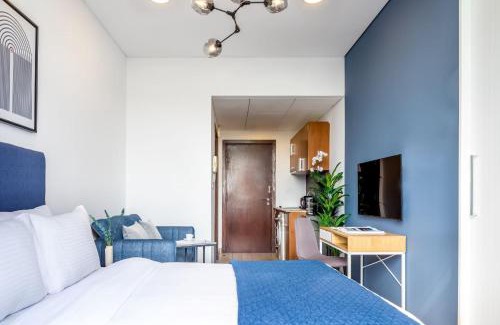 Bur Dubai Apartment | Silkhaus modish studio with Burj Khalifa view, pool access