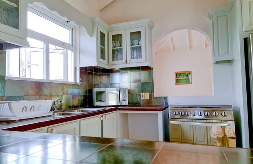 Silver Sands Apartment | Silver Sands Beachfront Condo, Shared Patio - Bar & BBQ, Indoor & Outdoor Dining