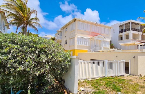 Silver Sands Apartment | Silver Sands Beachfront Condo, Shared Patio - Bar & BBQ, Indoor & Outdoor Dining
