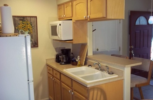 Village Grove House | Single level standalone cottage 1 bedroom 1 bath with attached garage