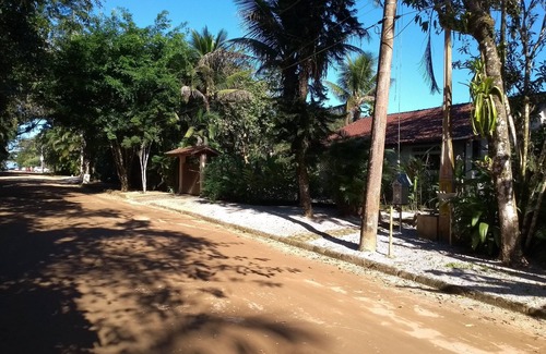 Itamambuca House | Single-storey house with swimming pool.