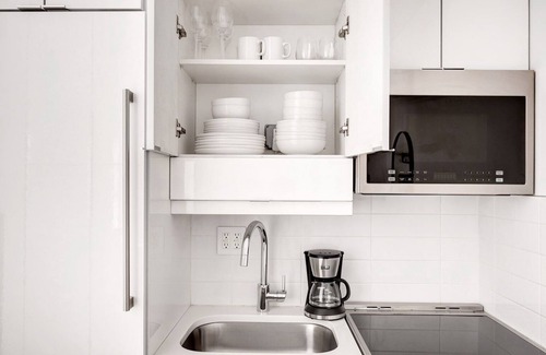 Little Italy Apartment | Sleek Little Italy 1BR w/in-unit W/D, short walk to SoHo, by Blueground