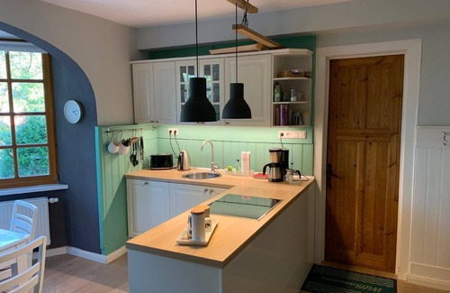 Bleckede Apartment | Small holiday apartment with a bow front and a great view of the natural pond