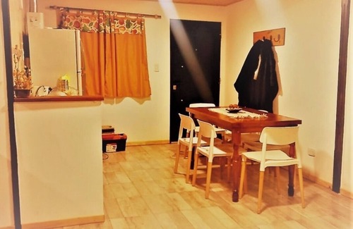 Trevelin House | "Small house on a raised hill, facing the imposing Andes mountain range."