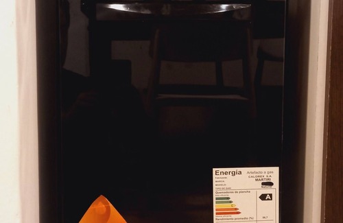 Trevelin House | "Small house on a raised hill, facing the imposing Andes mountain range."