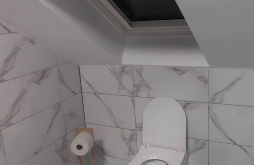 Lochgau Condo | Small room with kitchenette and private bathroom.