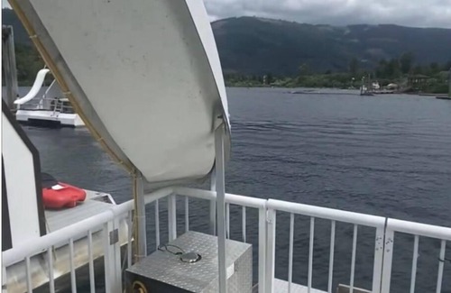 Lake Cowichan Boat Rental | “Snowbird” Houseboat with roof top Hot tub and Slide.